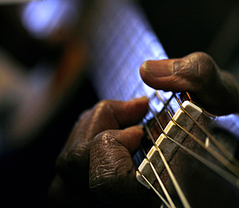 photograph: hands playing guitar